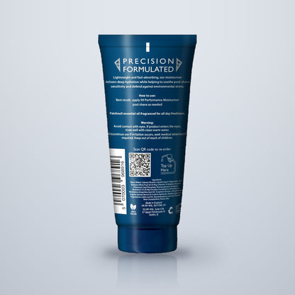 The back of a dark blue cosmetic squeeze tube 99ninetynine Precision Moisturizer shown on a light gray gradient background with a soft reflection below.